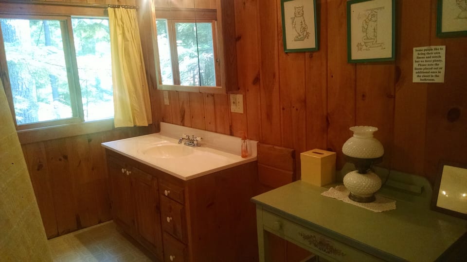 Bathroom with tub/shower. Very clean.