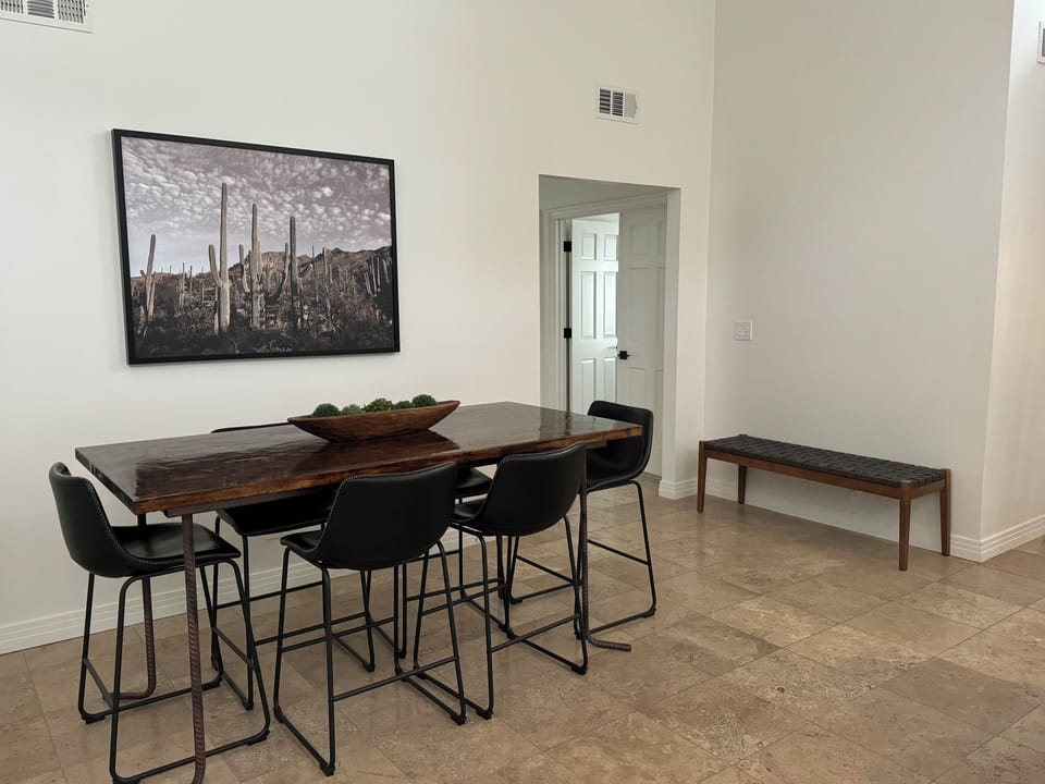 Entrance to east corridor with three bedrooms and three bathrooms.