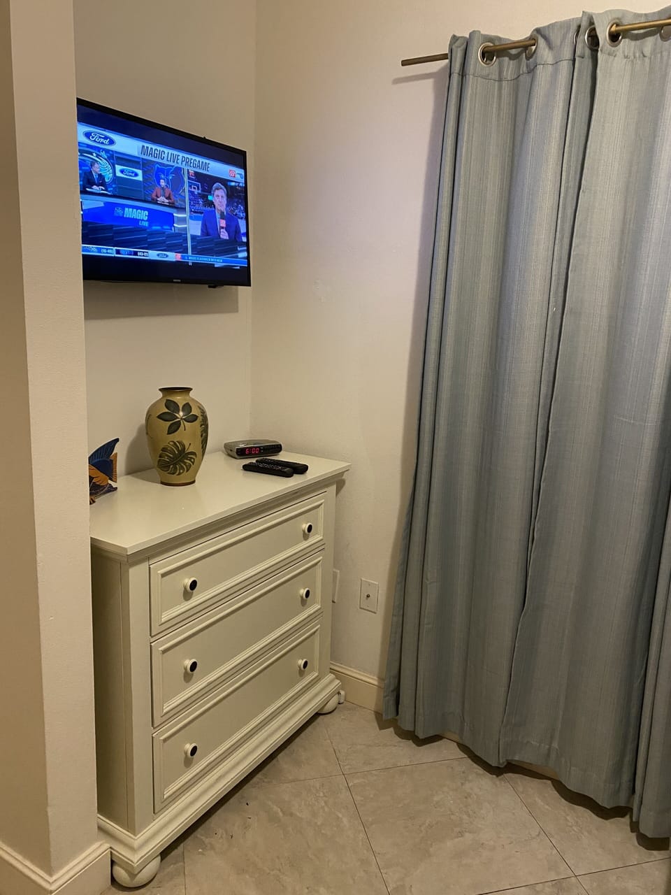 The dresser and TV in the bunk room