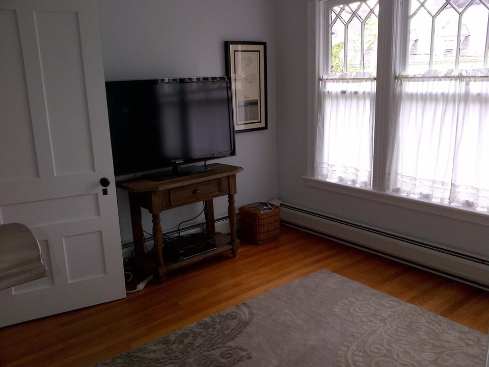 Upstairs sitting room w/ television