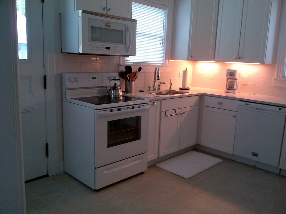 Kitchen. Window over sink looks into back yard.