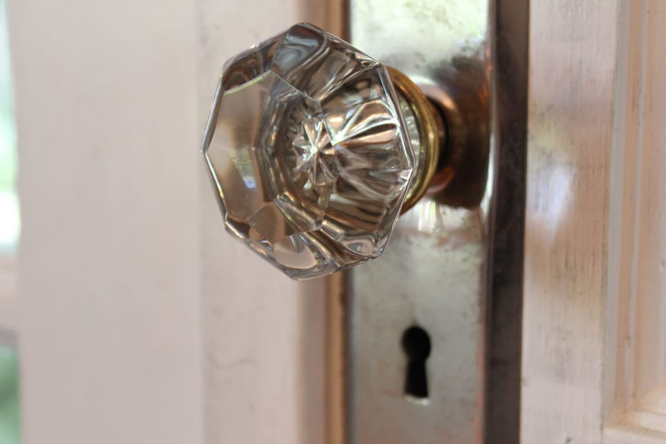 Original doorknobs add to the historic charm. 