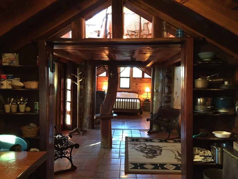 Looking into the downstairs bedroom from across the cabin.
