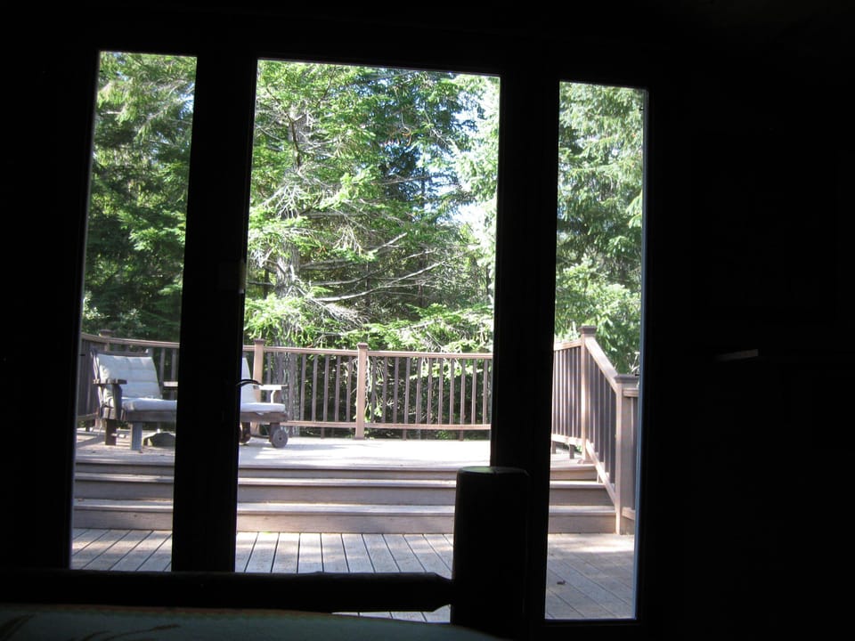Looking out onto the upper deck from the upstairs bedroom...