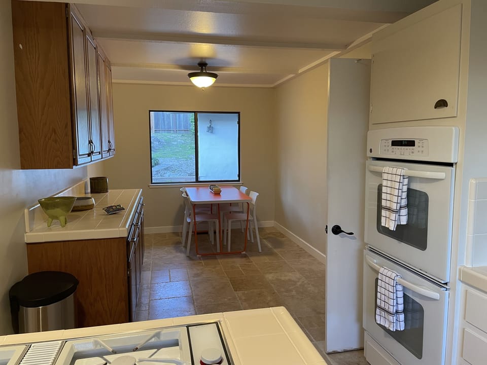 Informal dining area adjacent to kitchen