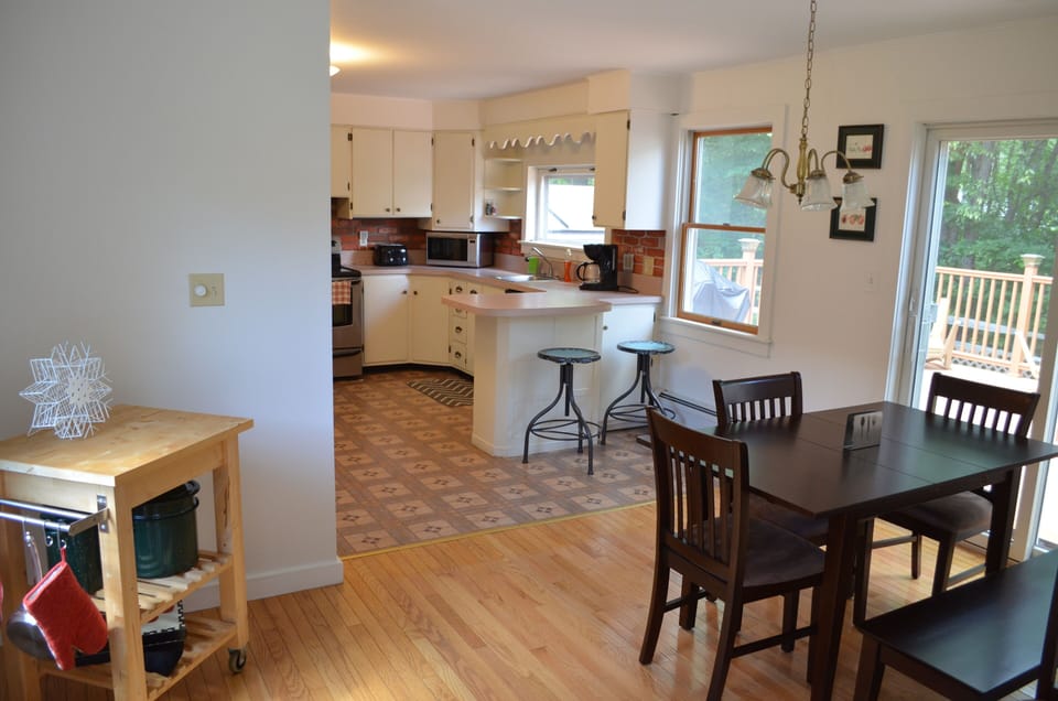 Dining Rm + Breakfast Bar from Side Entry off Driveway