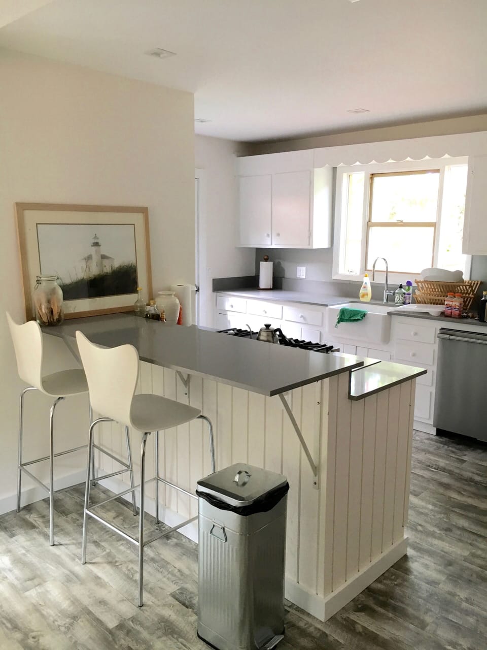 Couch view of open kitchen.