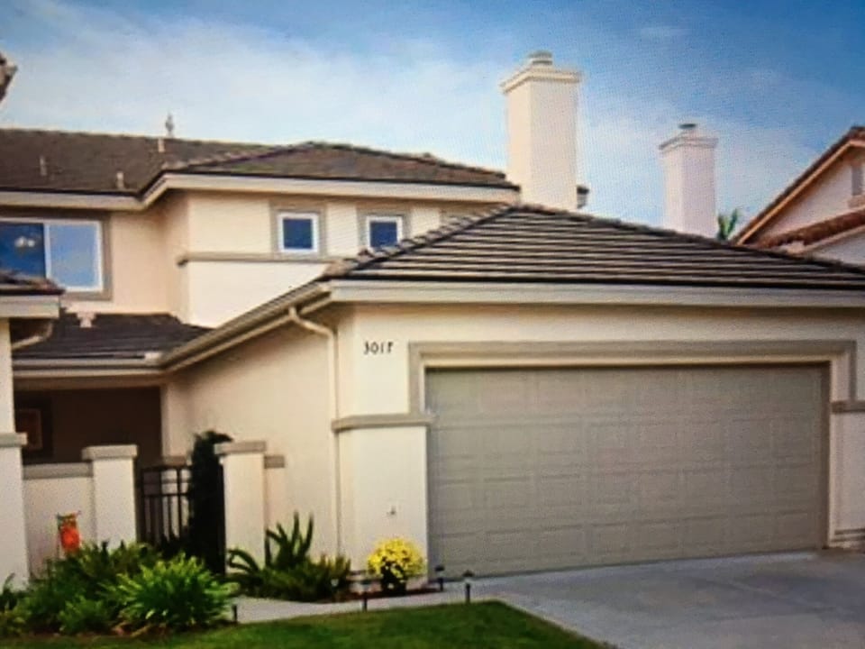 Welcome to our twin home.  Entrance with private gate and sitting area.