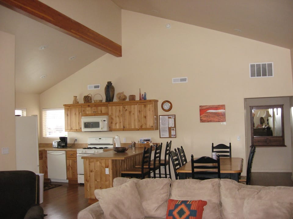 View from great room into kitchen and dining room