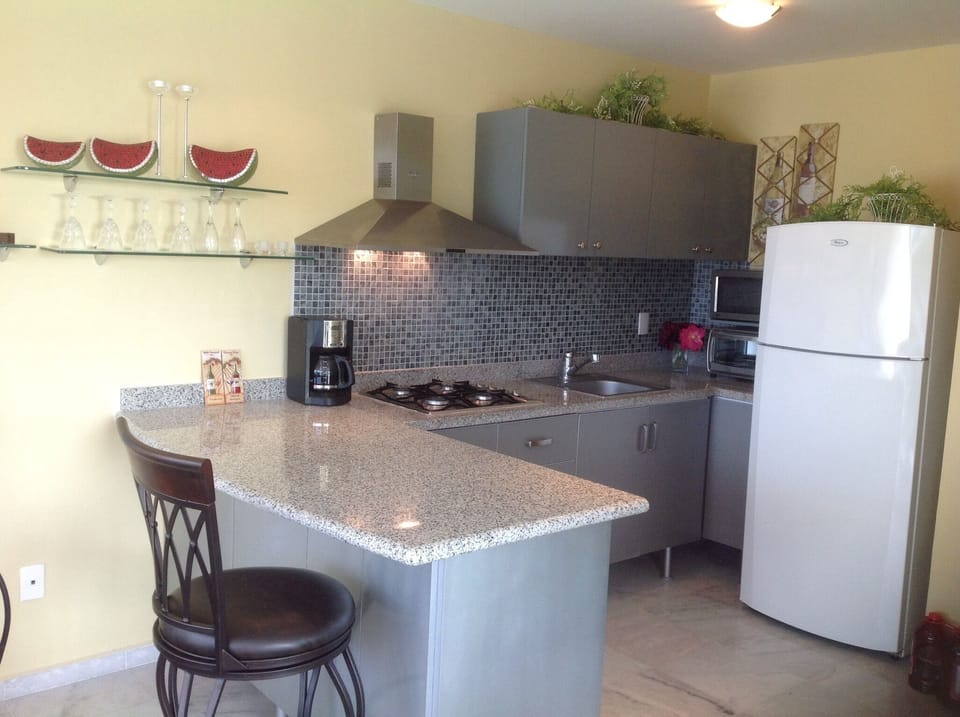 Kitchen with an upgraded breakfast bar