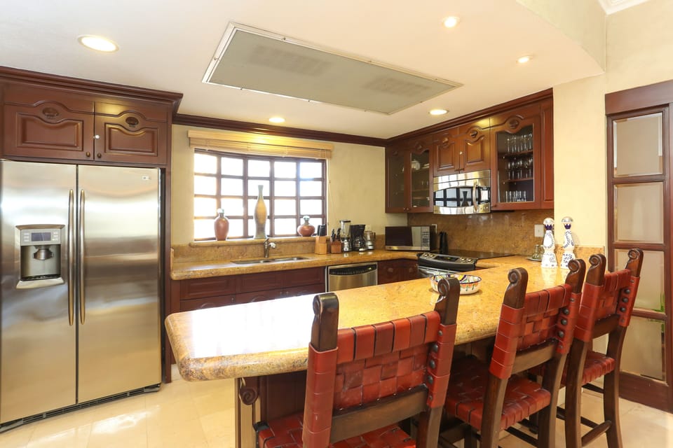 The kitchen and breakfast bar.