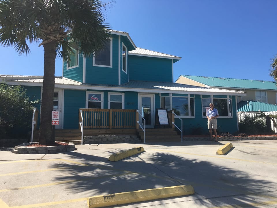 Front of Beach Club House.  Cafe, Beach side Pool and Beach itself on other side