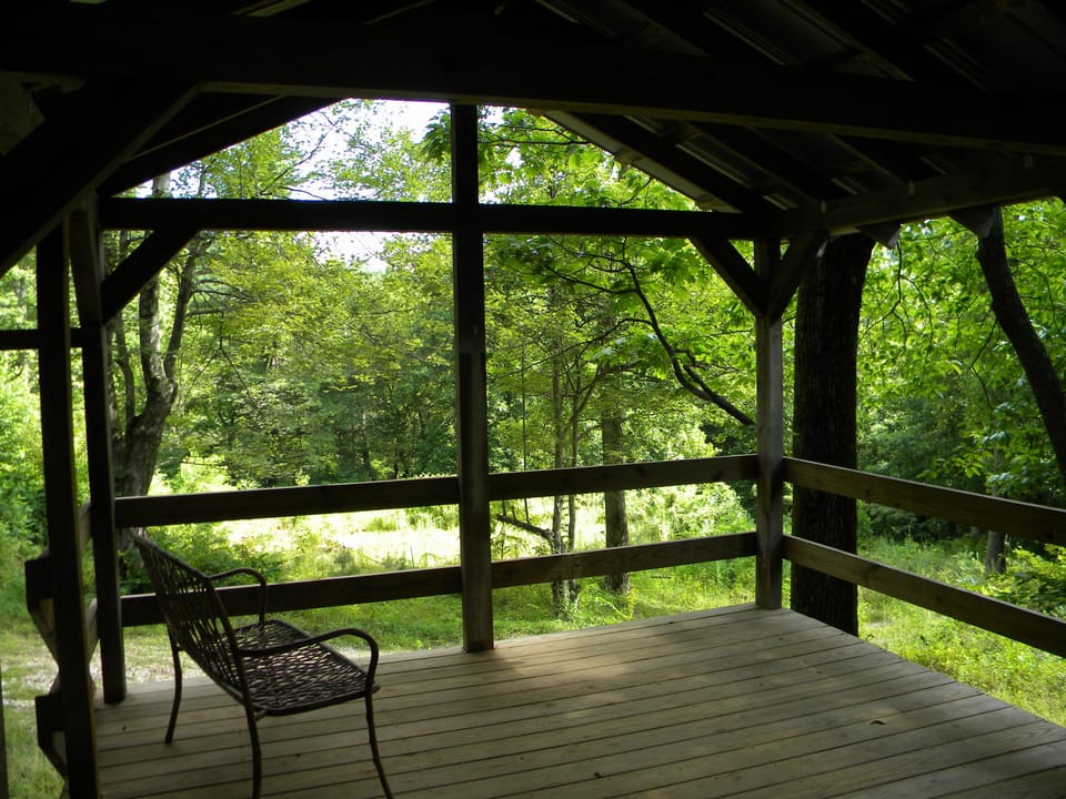 Balcony, is setup for 3 hammocks.