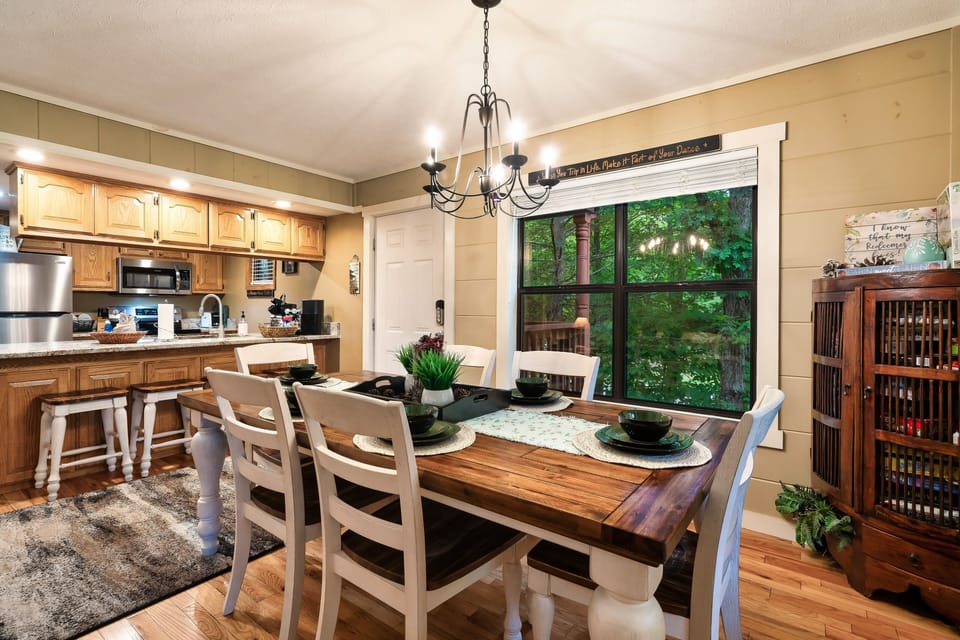 Dining table for 6 and an additional 4 barstools.