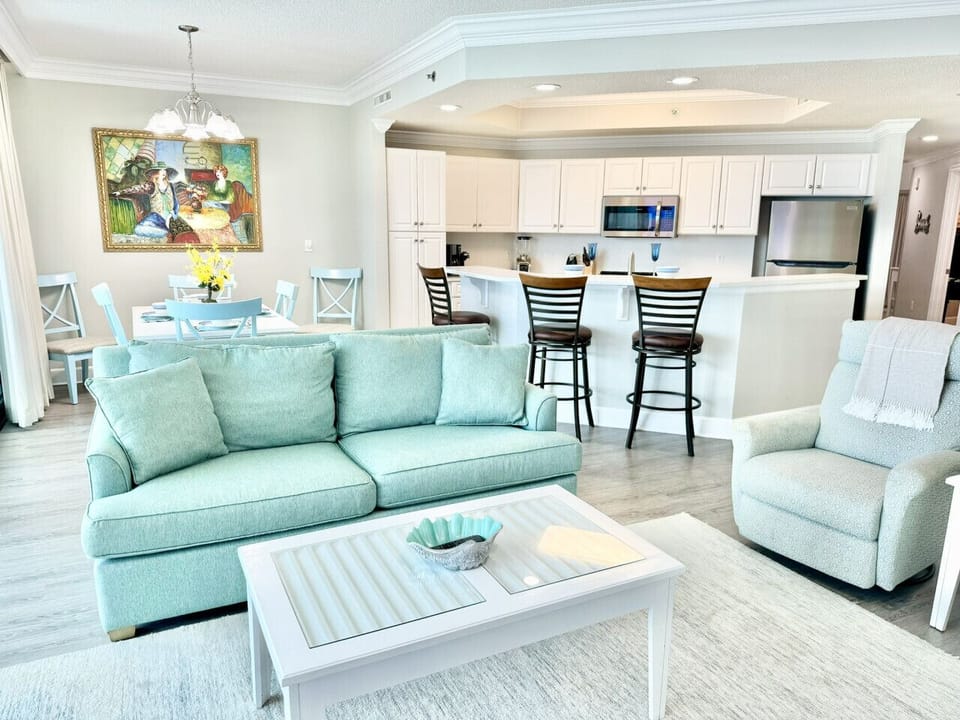 Living Room features a sleeper sofa couch and two recliners.