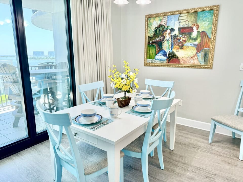 Formal dining table with room for 4 to eat comfortably.