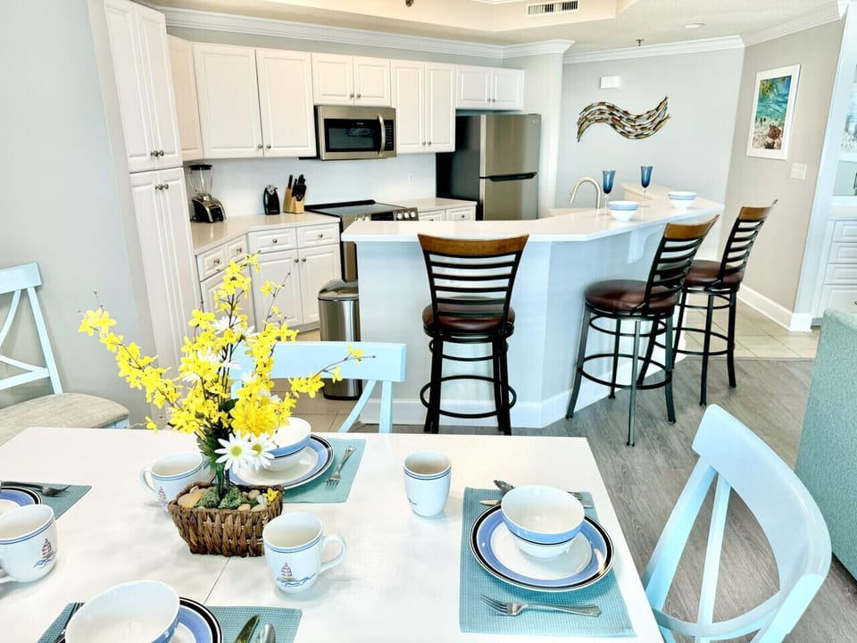 Sitting at the kitchen countertop does not remove you from the conversation.