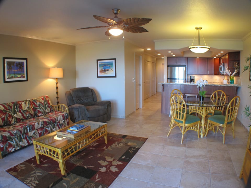 Living & dining area with island style furnishing, fan & AC 