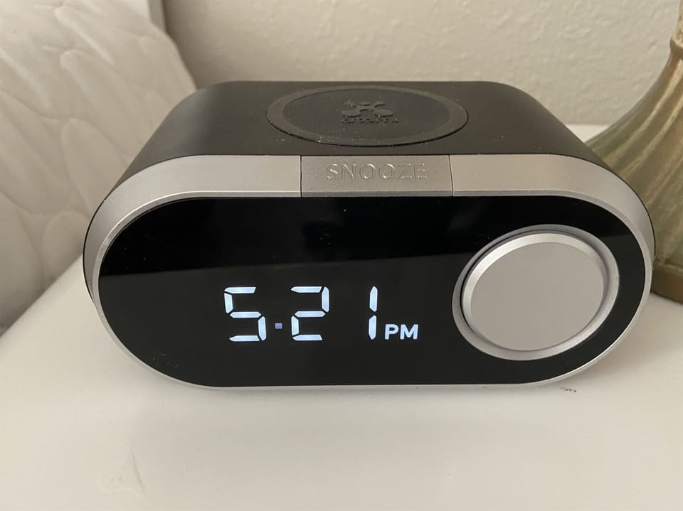 Alarm Clock and a charging station...just set your iPhone on top