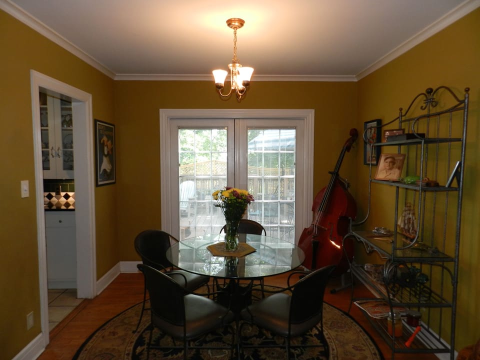 Dining room opened onto the common area back yard and 3-level deck/hot tub