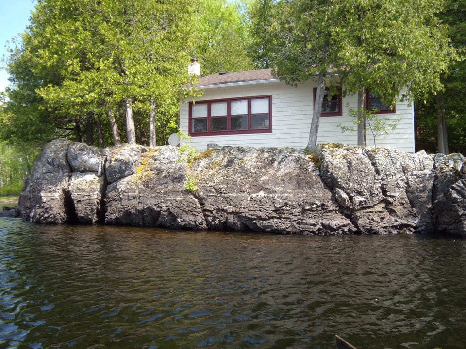 Cliff point cottage before the deck