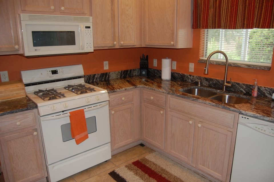 Modern, fully equipped kitchen with premium appliances.