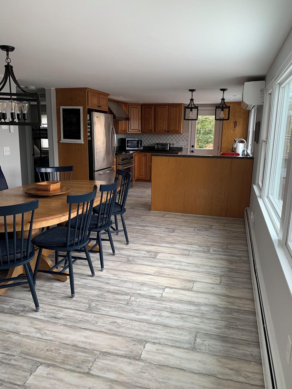 Large eat in kitchen iff the family room with views of the pond 