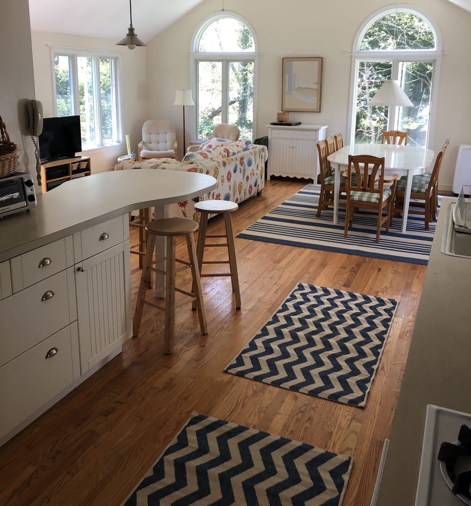 Open floor plan kitchen, living & dining room opens to back patio. 