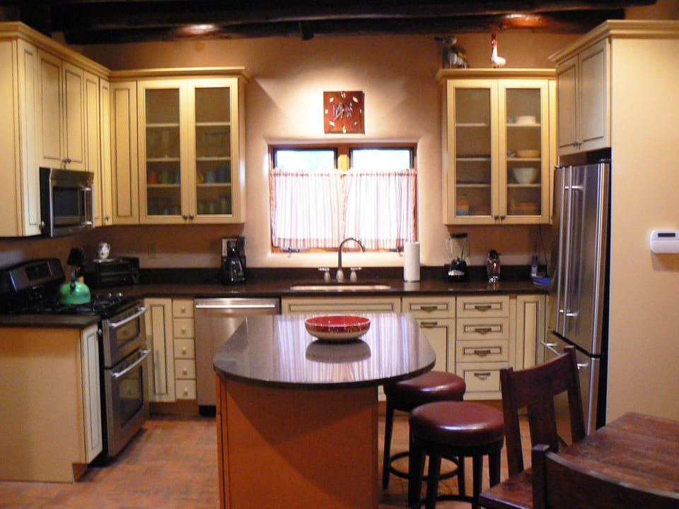 High end appliances and lots of convenient workspace makes this kitchen a dream.