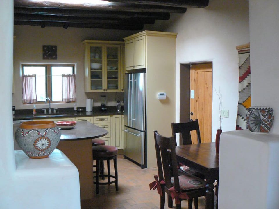 A gourmet kitchen with plenty of seating.