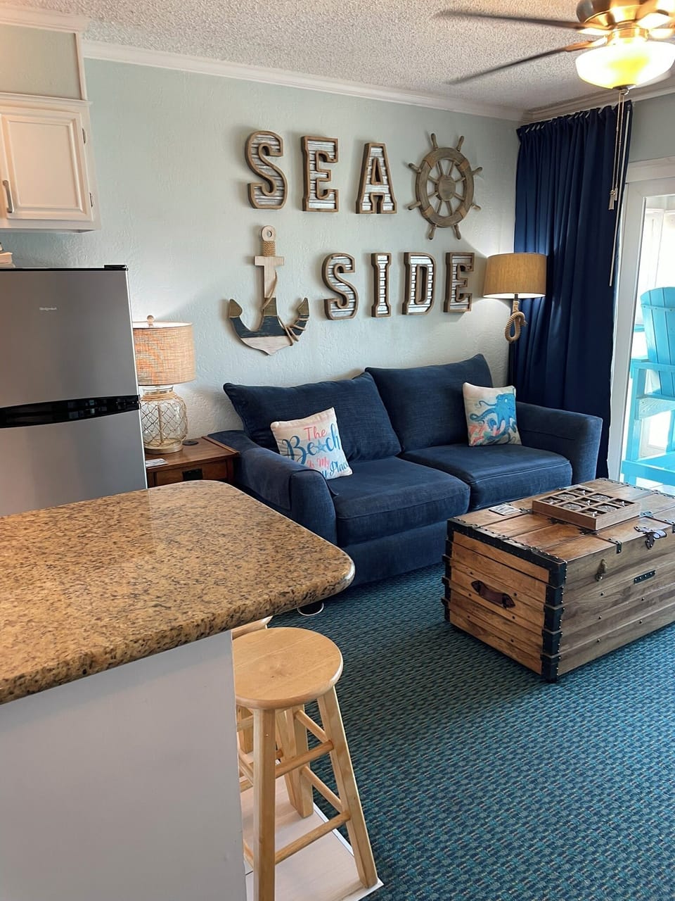 Living area with great ocean view! Board games in coffee table treasure chest.