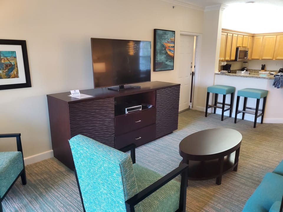 Entertainment area of larger 1br, door to smaller 1br