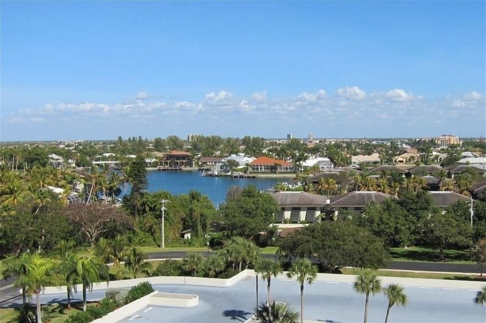 View of Intercoastal from kitchen, entry & guest bedroom. Provides crosswinds.