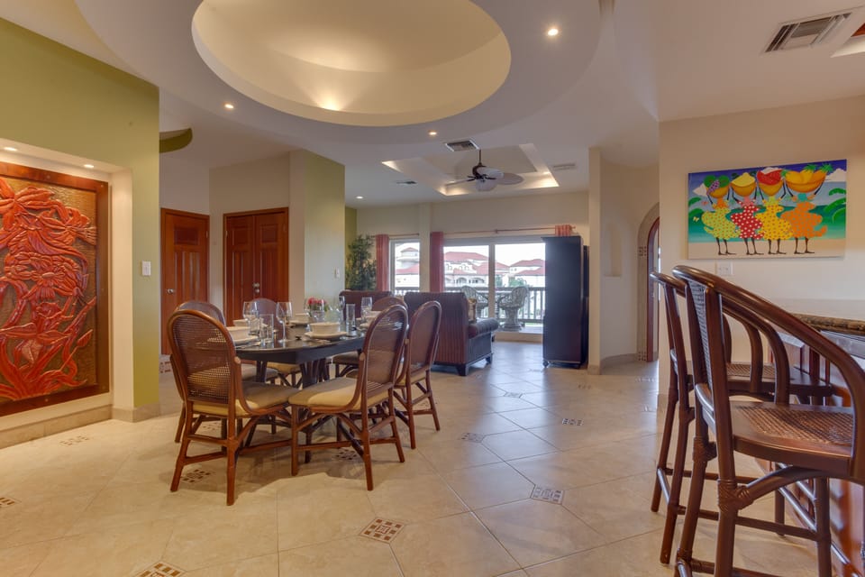 Lots of seating and dining table and bar.