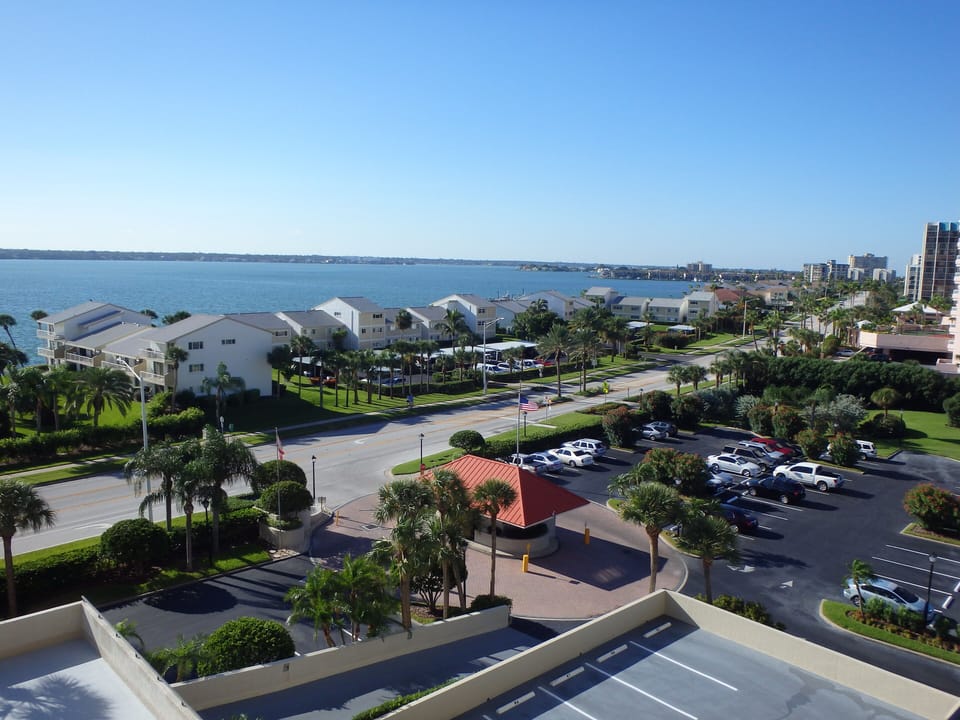 View of 24 hr security gatehouse, Gulf Blvd, and waterway from front door. 