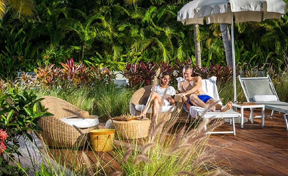 Relaxing by the pool - pool bar nearby