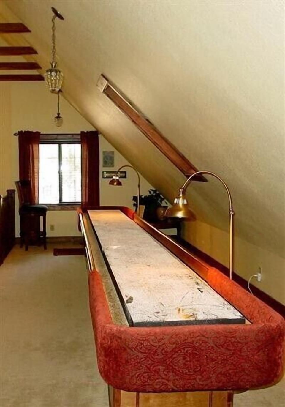 22 Ft Restored 1930s Shuffleboard Table on 3rd Floor Loft. Also on Floor is Wii.