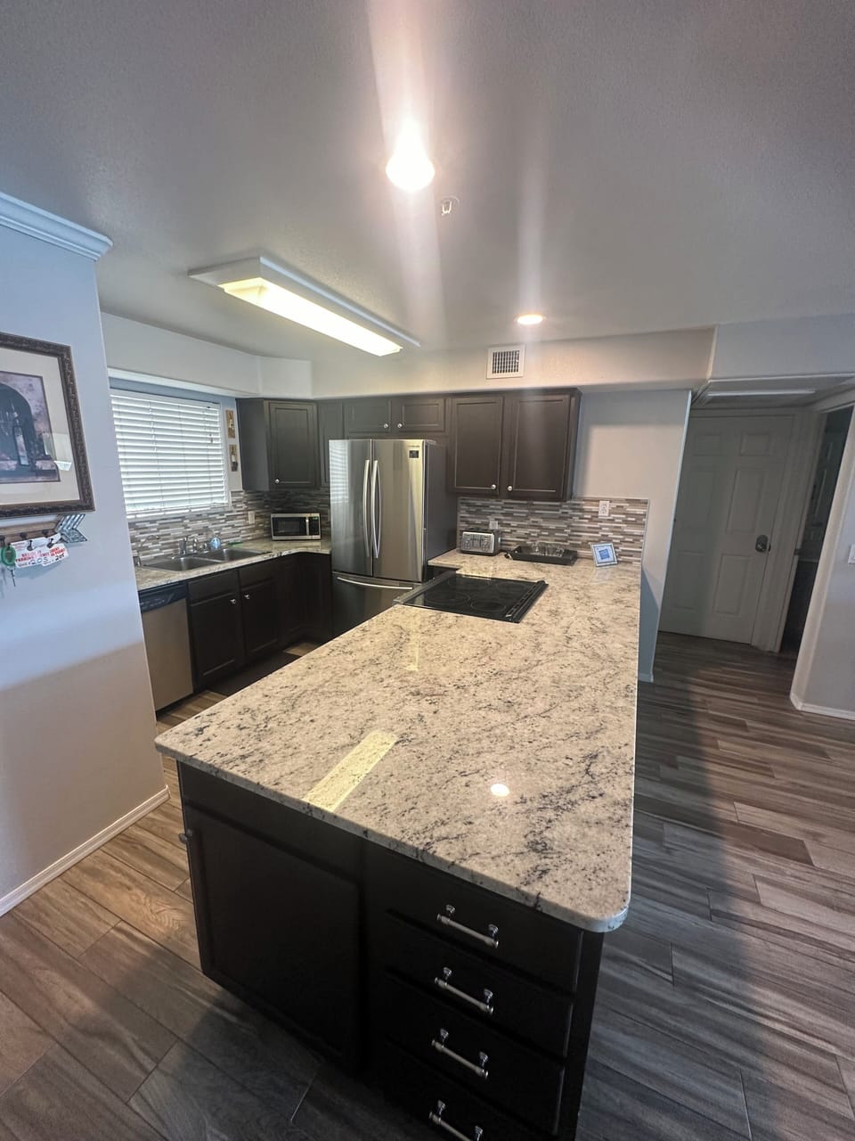 GRANITE KITCHEN COUNTERS, STAINLESS APPLIANCES, DISHWASHER,COFFEE MAKER
