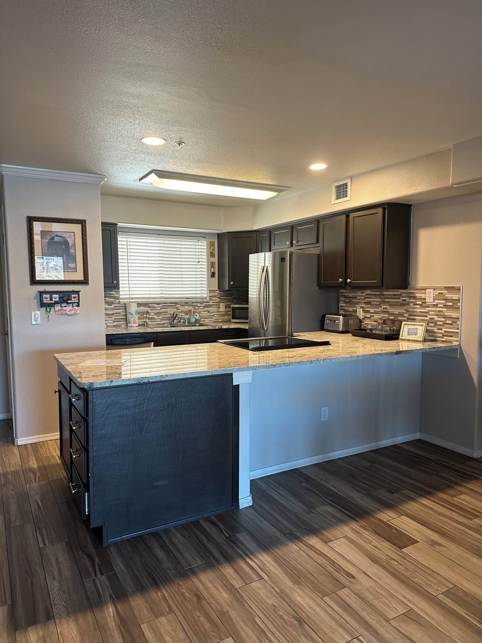 GRANITE KITCHEN COUNTERS, STAINLESS APPLIANCES, DISHWASHER,COFFEE MAKER