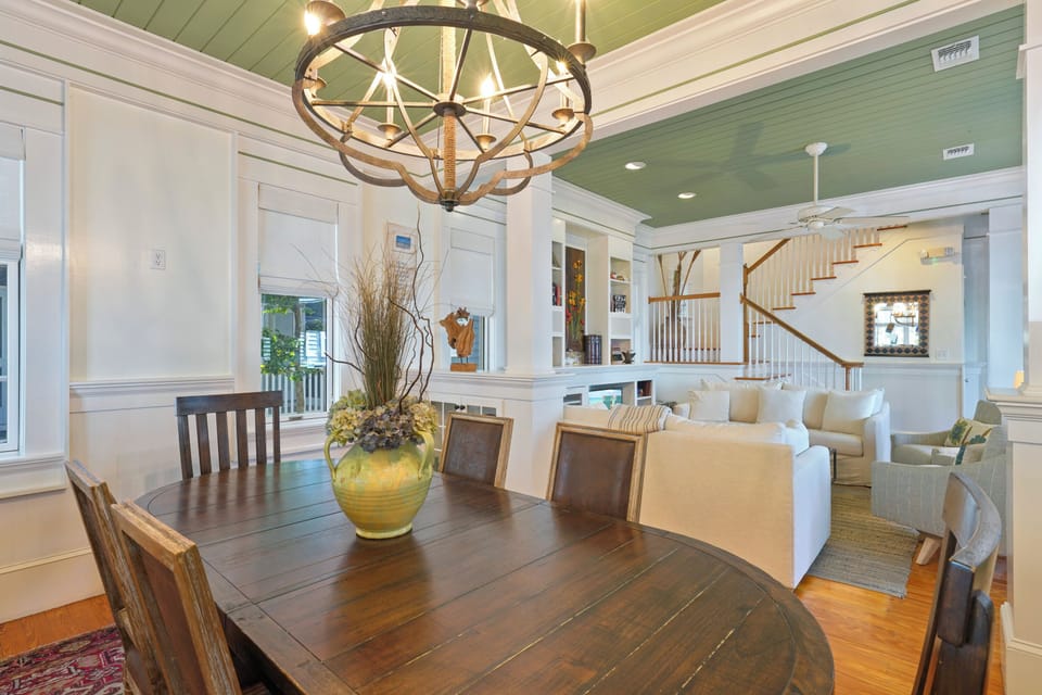 ADJACENT DINING AREA COMFORTABLY SEATS SIX
