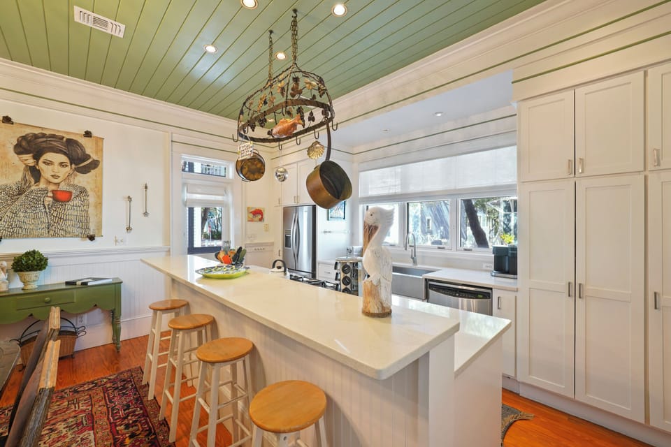 KITCHEN ISLAND WITH BARTOP SEATING FOR 4