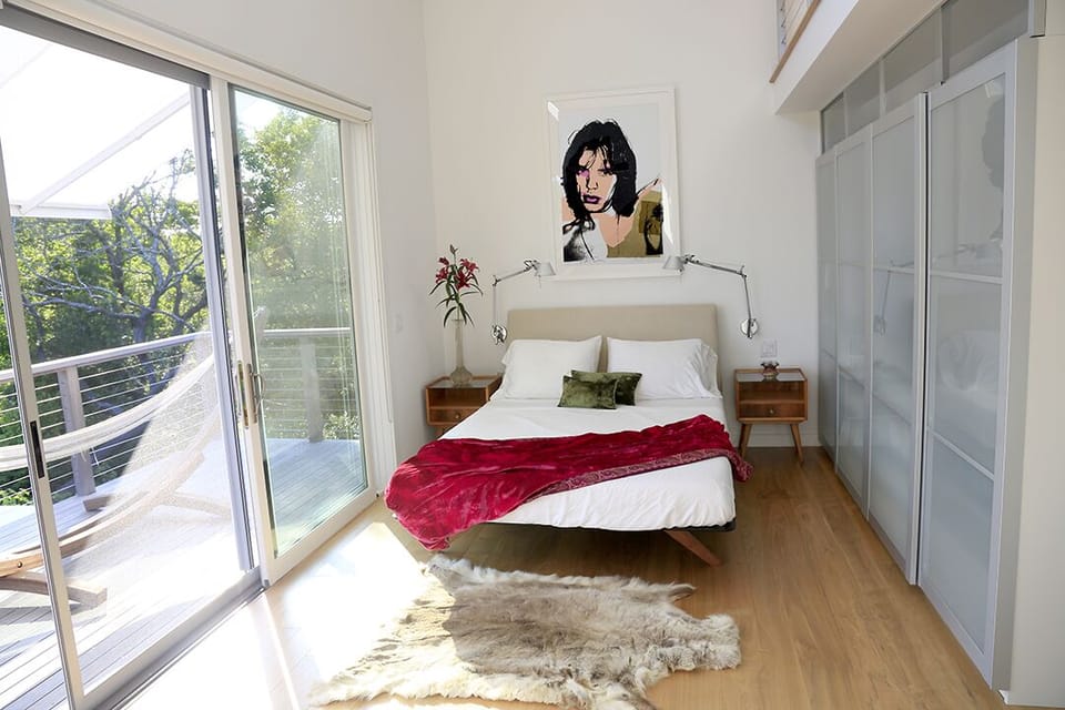 Master Suite with outdoor deck and hammock