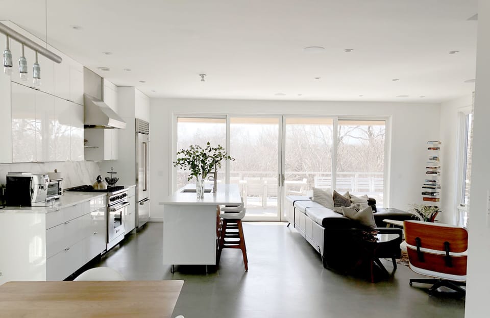 Expansive downstairs living area opens to outdoor private deck