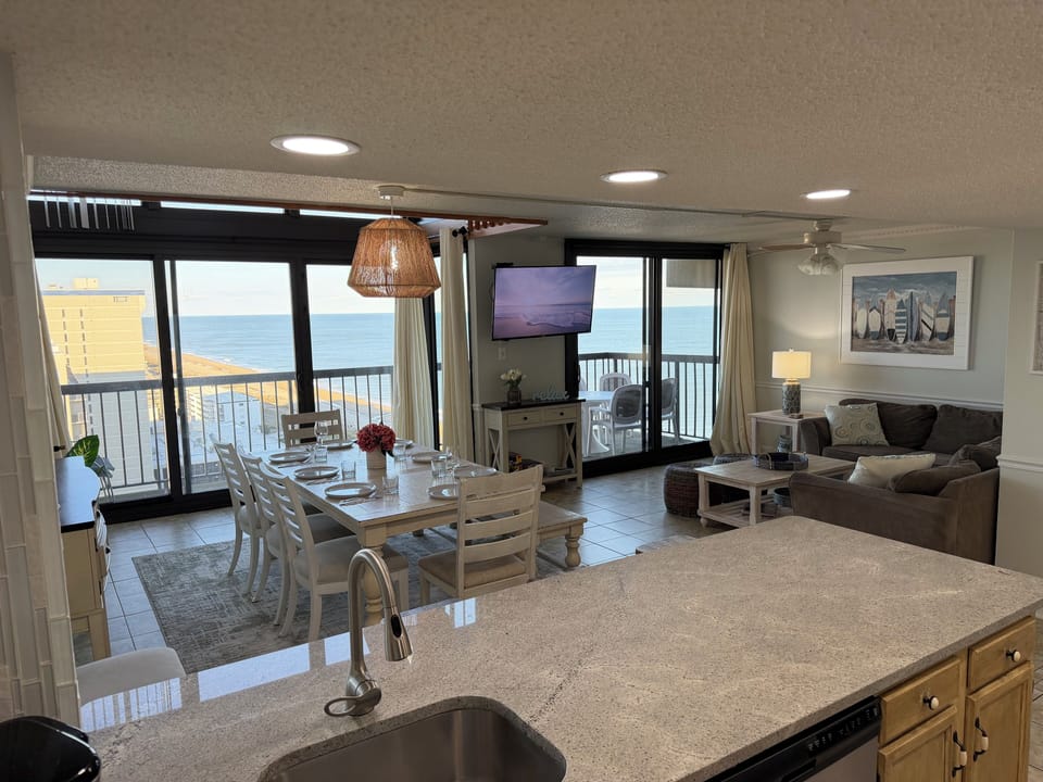 Spacious living, dining area overlooking the ocean