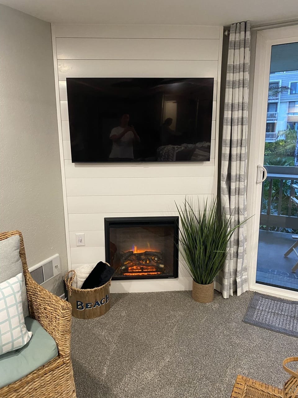 55" tv, electric fireplace w/heater and new wall heaters throughout.