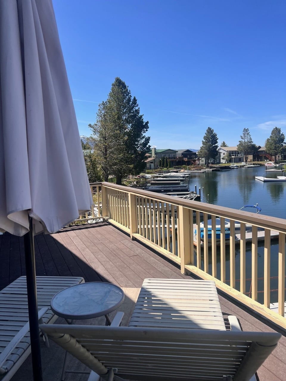 Large upper deck off Master bedroom boat rm with spiral staircase to lower deck