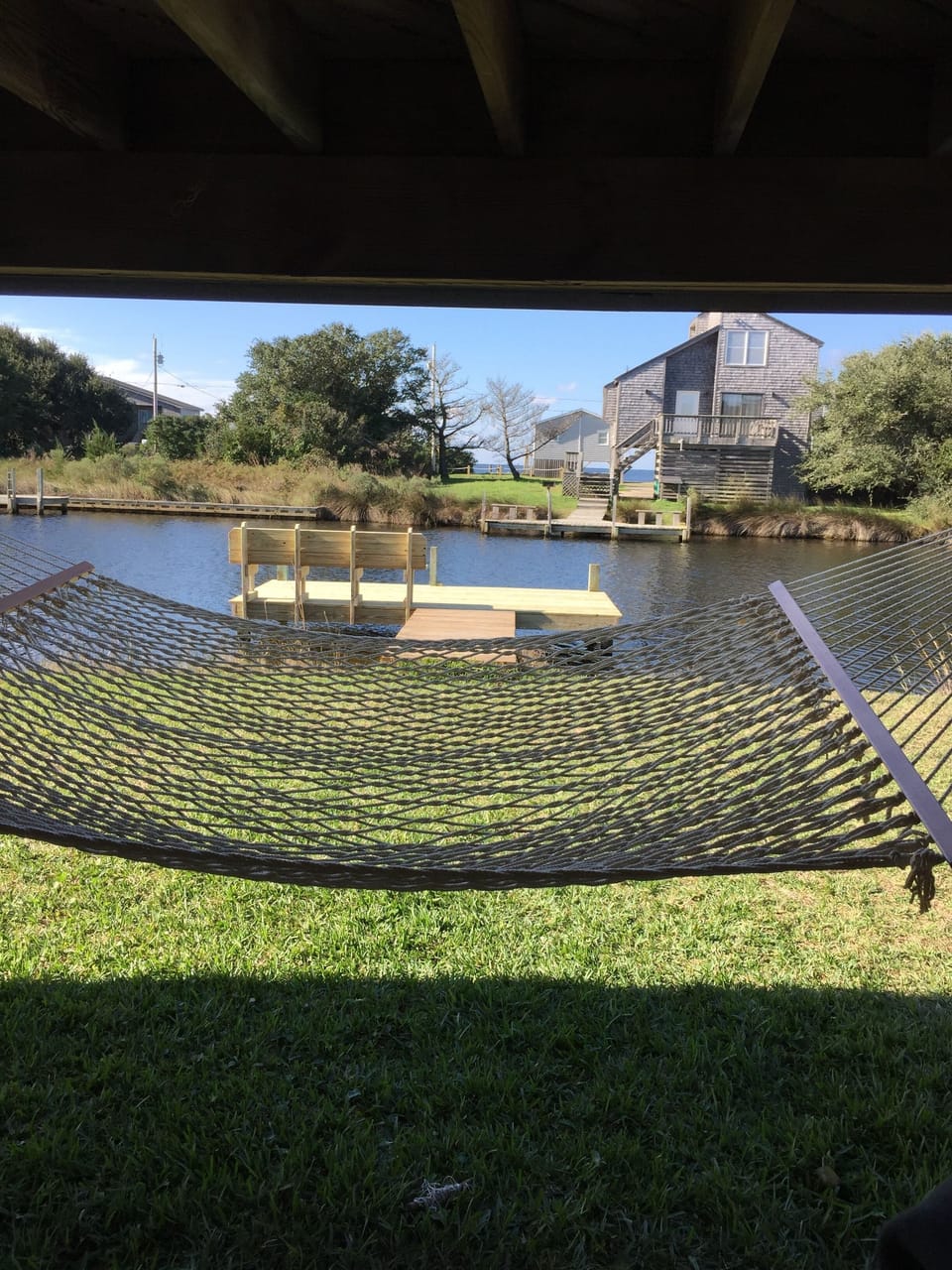 Take a load off and relax by the water on a hammock