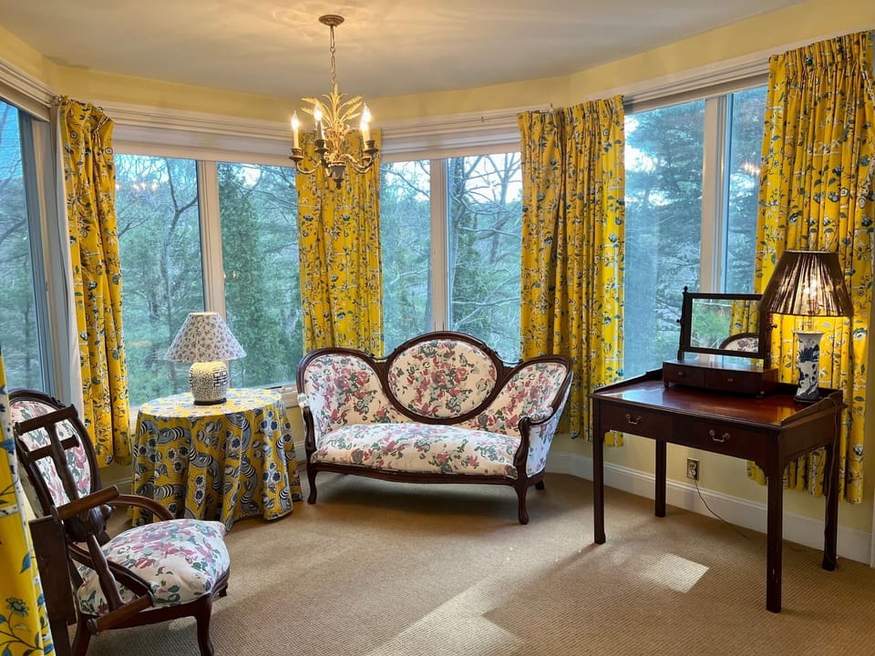 Enjoy some quiet time in the sitting room of the master suite.