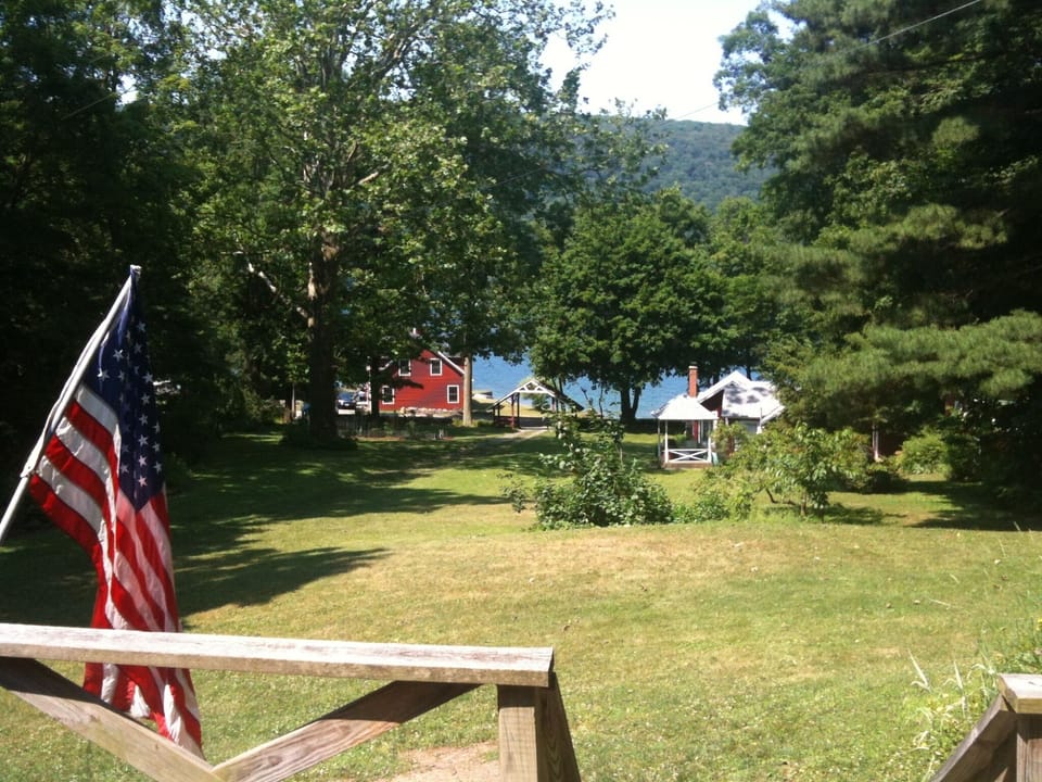 Front lawn from porch of brown cottage (which is vacant and not rented)