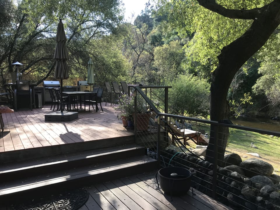 Deck off kitchen sliding glass doors

